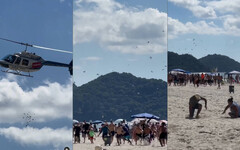 巴西女網紅搭直升機「海灘上大撒幣」 整包現金灑落空中遊客超嗨