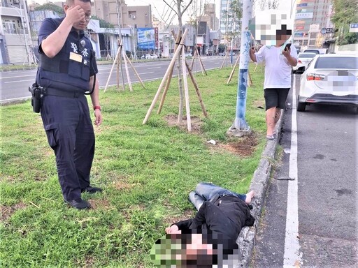睡臥安全島 北興警關懷醉男揪感心