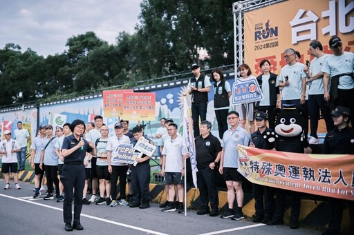 勇敢嘗試 爭取勝利 內湖分局結合特奧協會火炬跑 手持火炬參與台北科技盃路跑