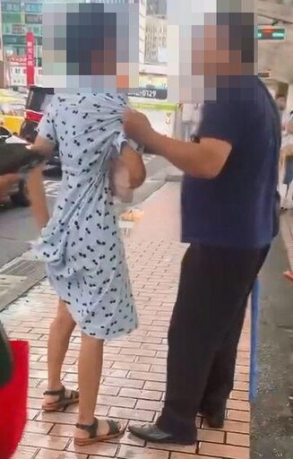 台北車站前驚見「持雨傘毆妻還拖行」！ 熱心民眾包圍制止